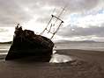 Ettrick Bay has a cafeteria, a flat, sandy beach and a shipwreck.