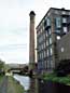 Former industrial buildings line the canal