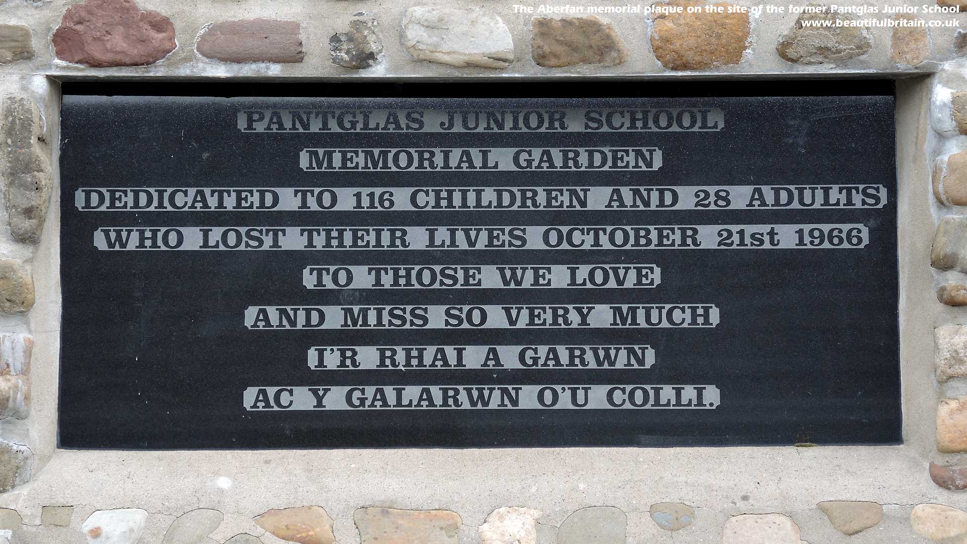 The plaque to those who died is on the wall of the former school site
