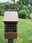 a mealworm feeder made from am open fronted robin box